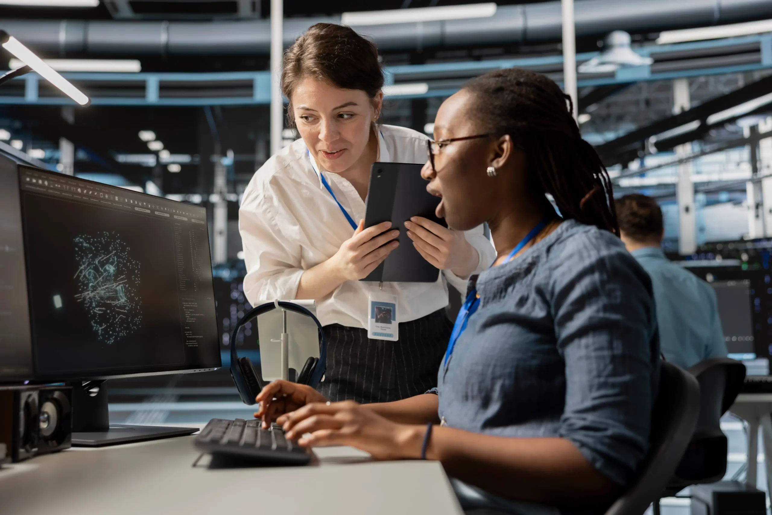 data-center-technicians-look-visualization-pc-screen (1) (1)